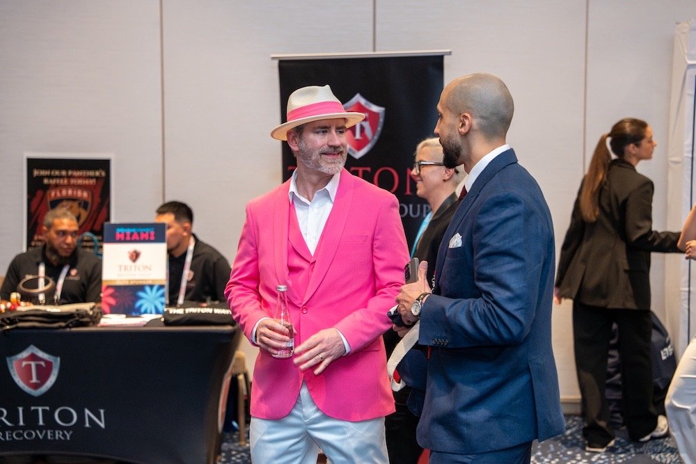 Vinnie Rodriguez networking with industry professionals at a conference